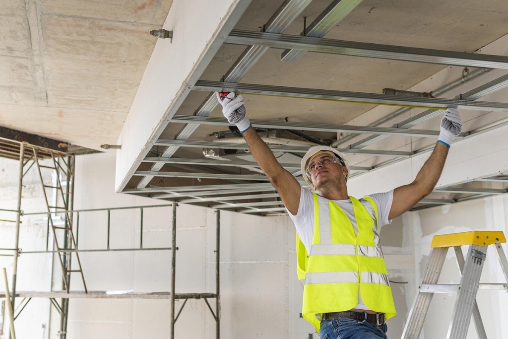 A man works at a construction site