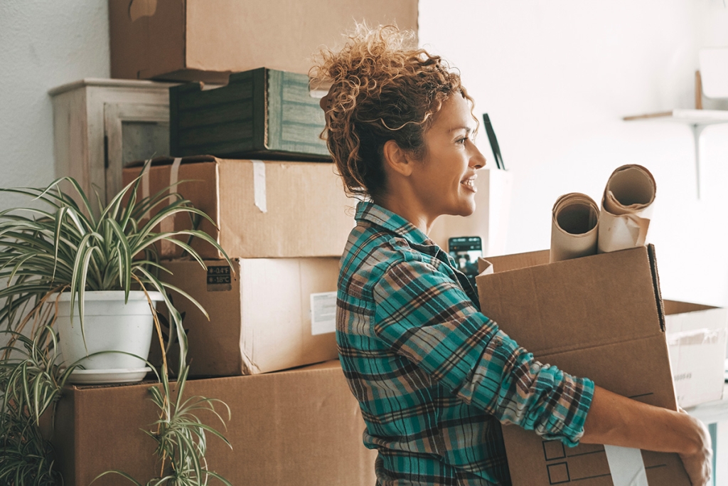 A woman moves into Rapid Rehousing